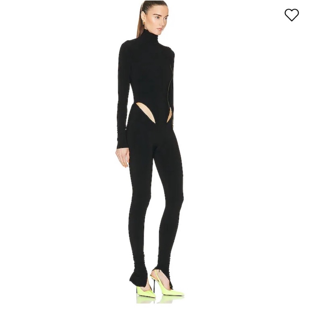 NWT LAQUAN SMITH
Hip Cut Out Turtleneck Jumpsuit